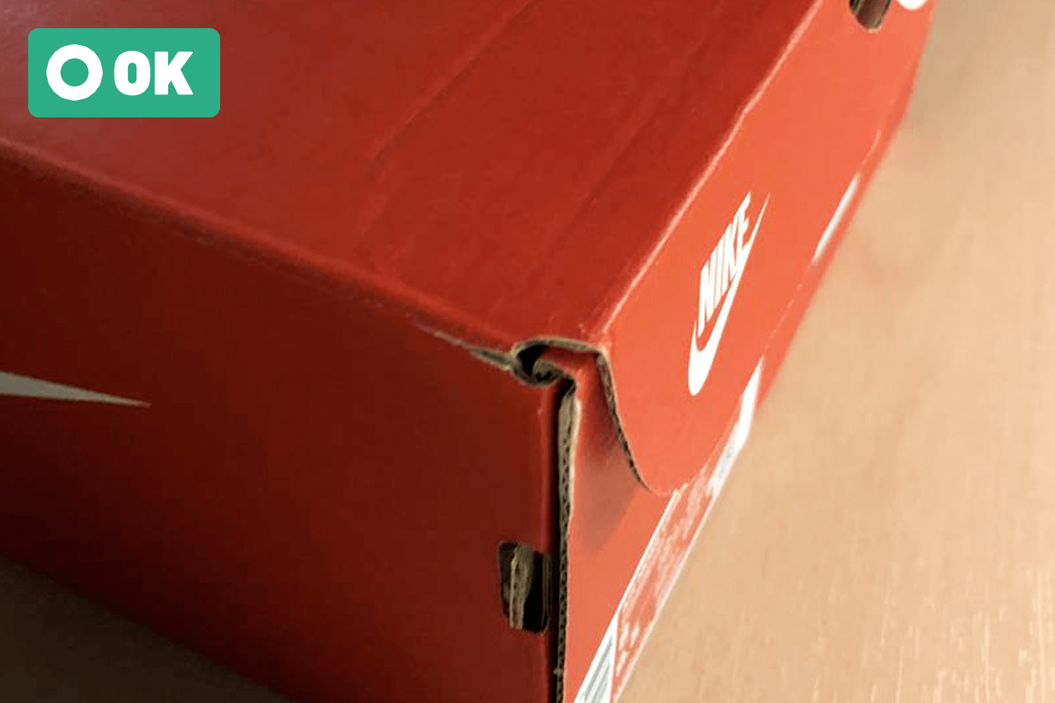 Small tears in the corners of the four corners of the box.