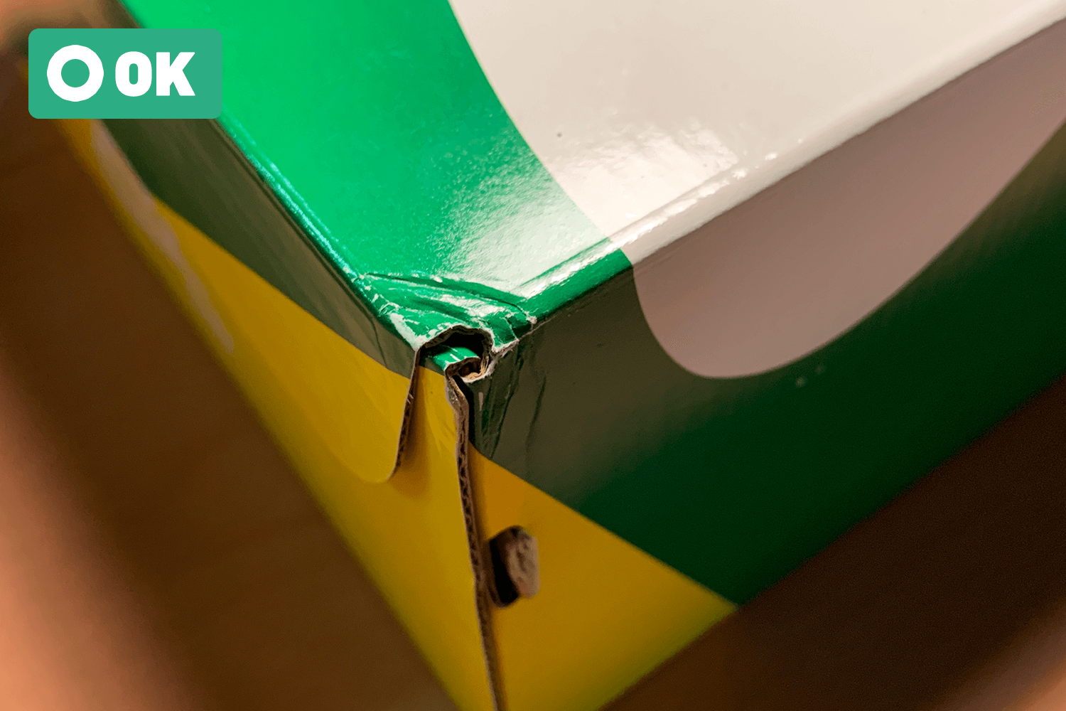 Light dents on the four corners of the box.