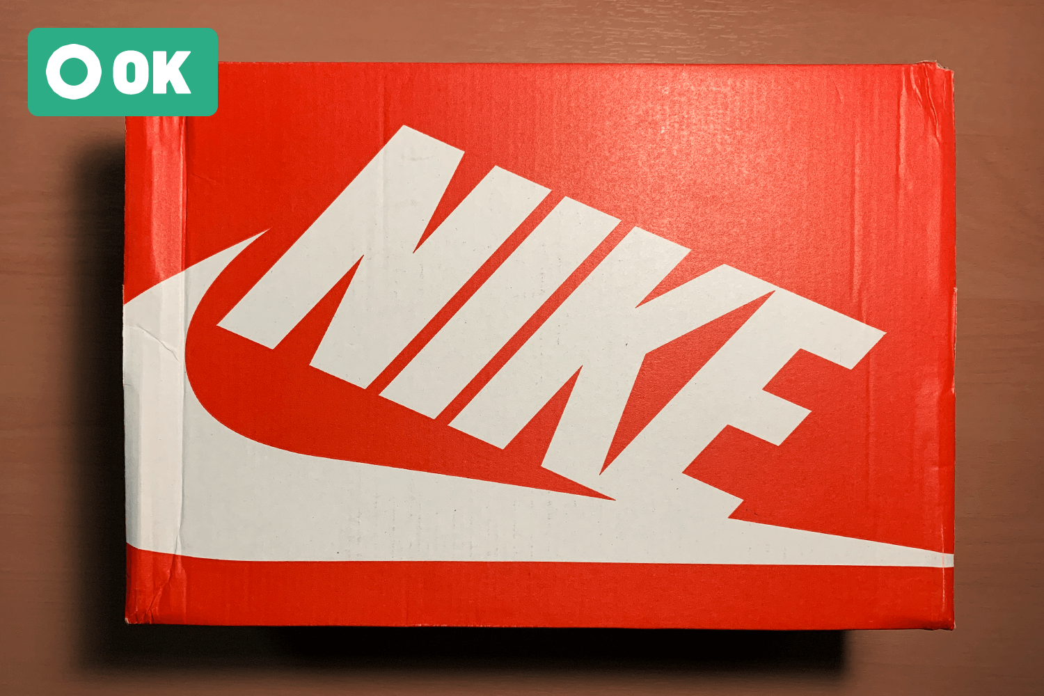 Light wrinkling on the box surface.