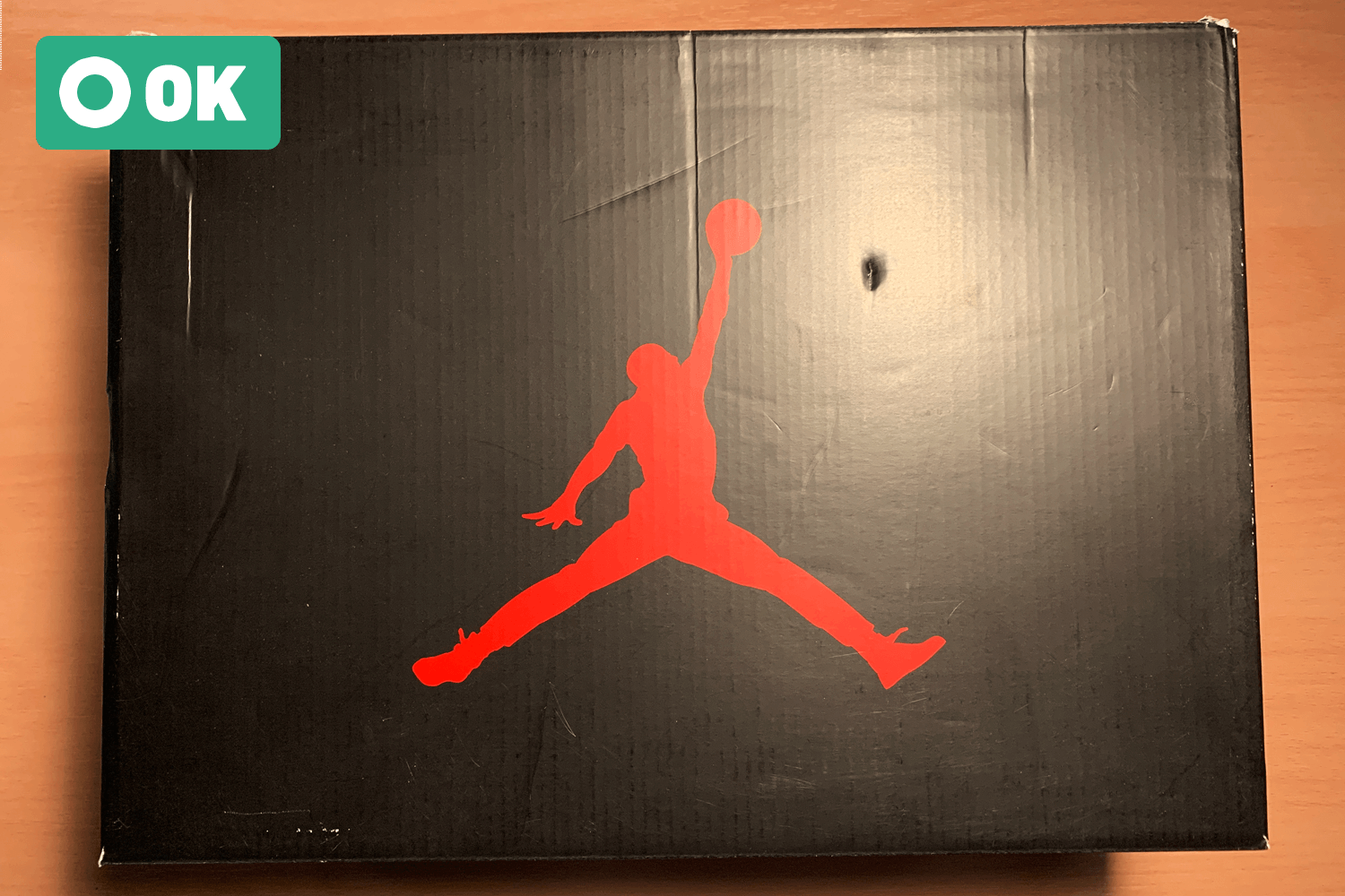 Small crushes and cuts on the box surface.