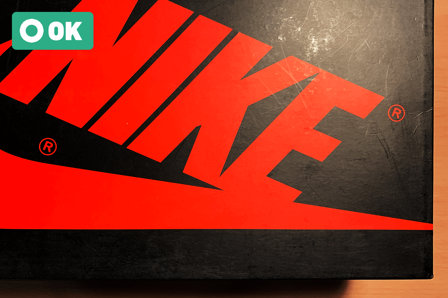 Light scratches on the box surface.